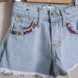 Kurze Denim-Applikationen