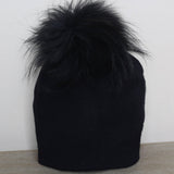 Geflochtene Bommelmütze