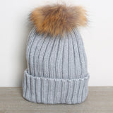 Geflochtene Bommelmütze