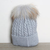 Geflochtene Bommelmütze