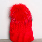 Geflochtene Bommelmütze