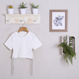 Geripptes T-Shirt mit Applikationen
